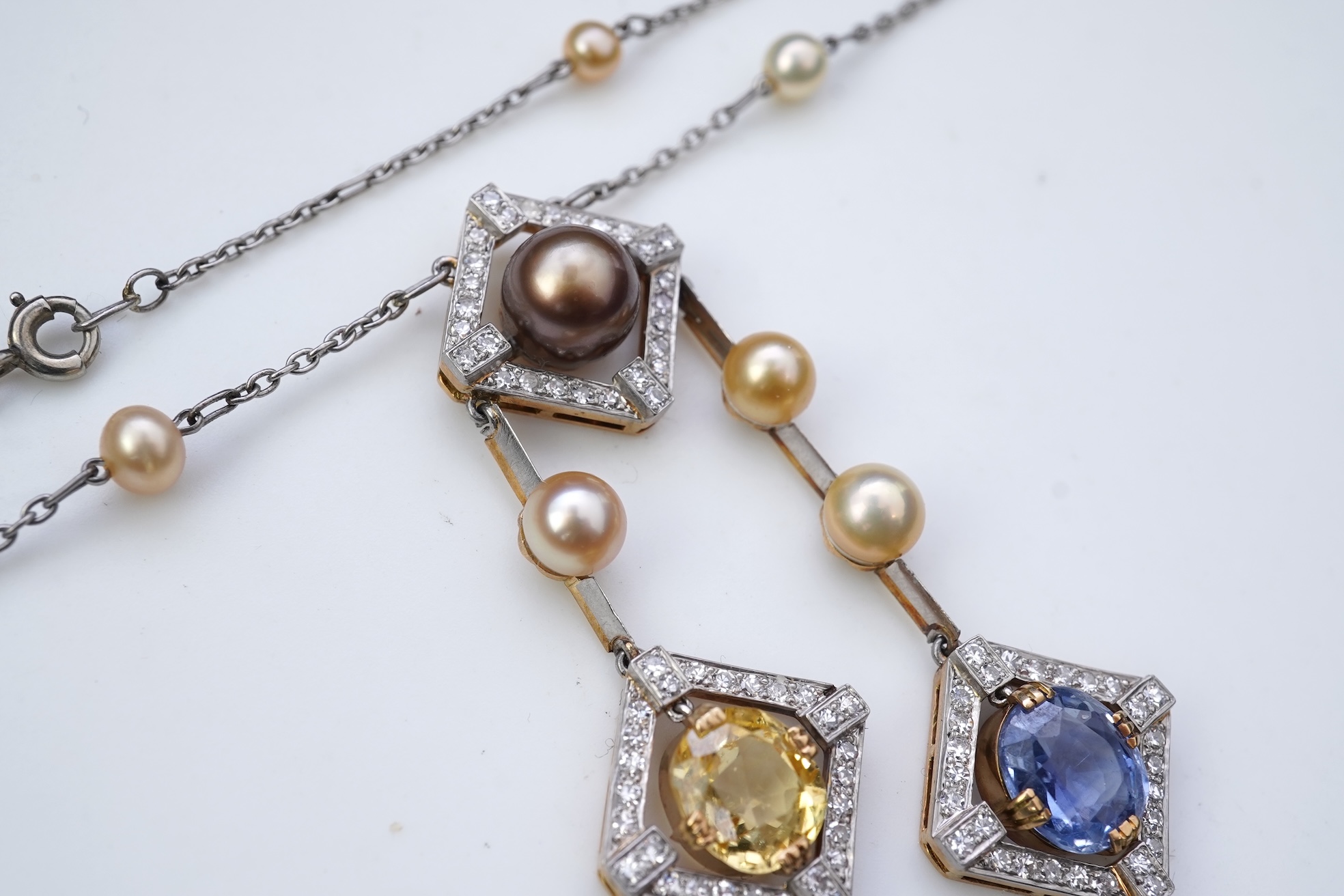 An Art Deco sapphire, natural pearl and diamond necklace, circa 1920